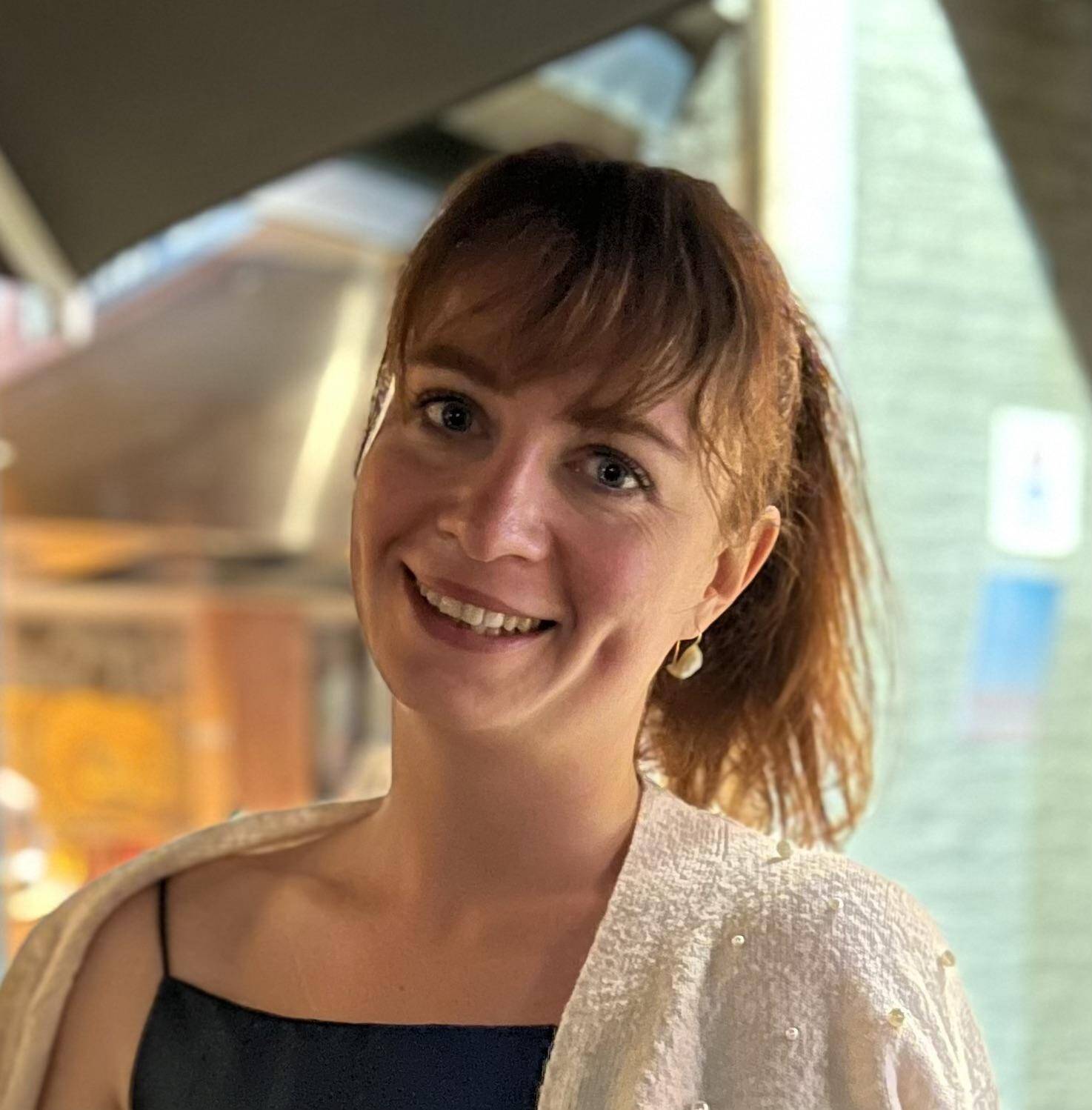 Julia  - Event Coordinator/Translator/Text Editor
