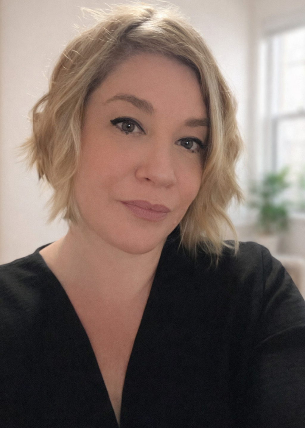 Mélanie E.