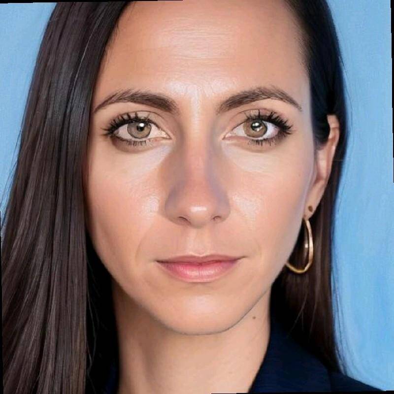 Laura E.