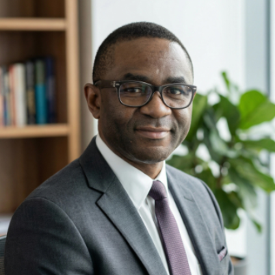 Kenny Olutola - System Design & AI Operations Consultant