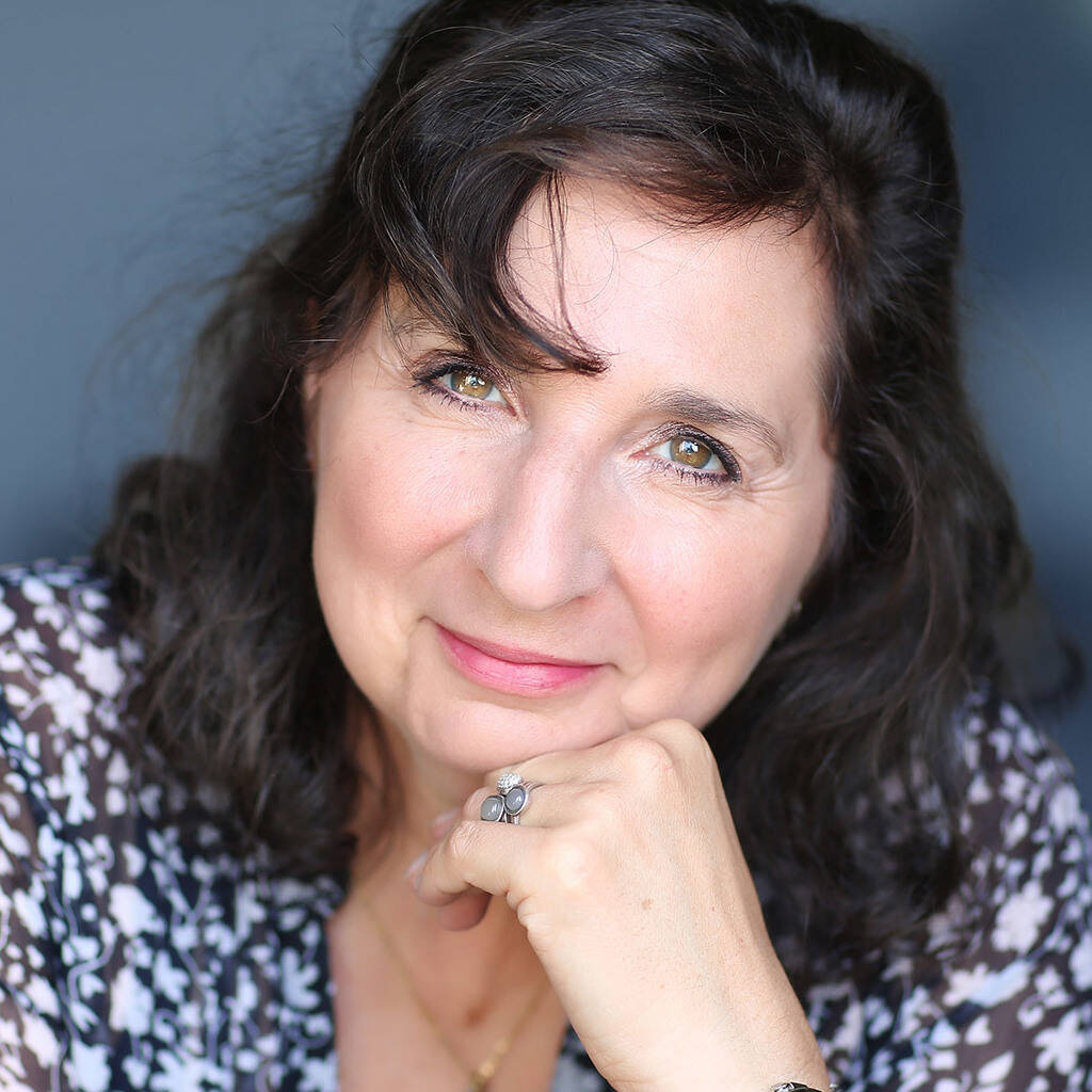 Camille L.